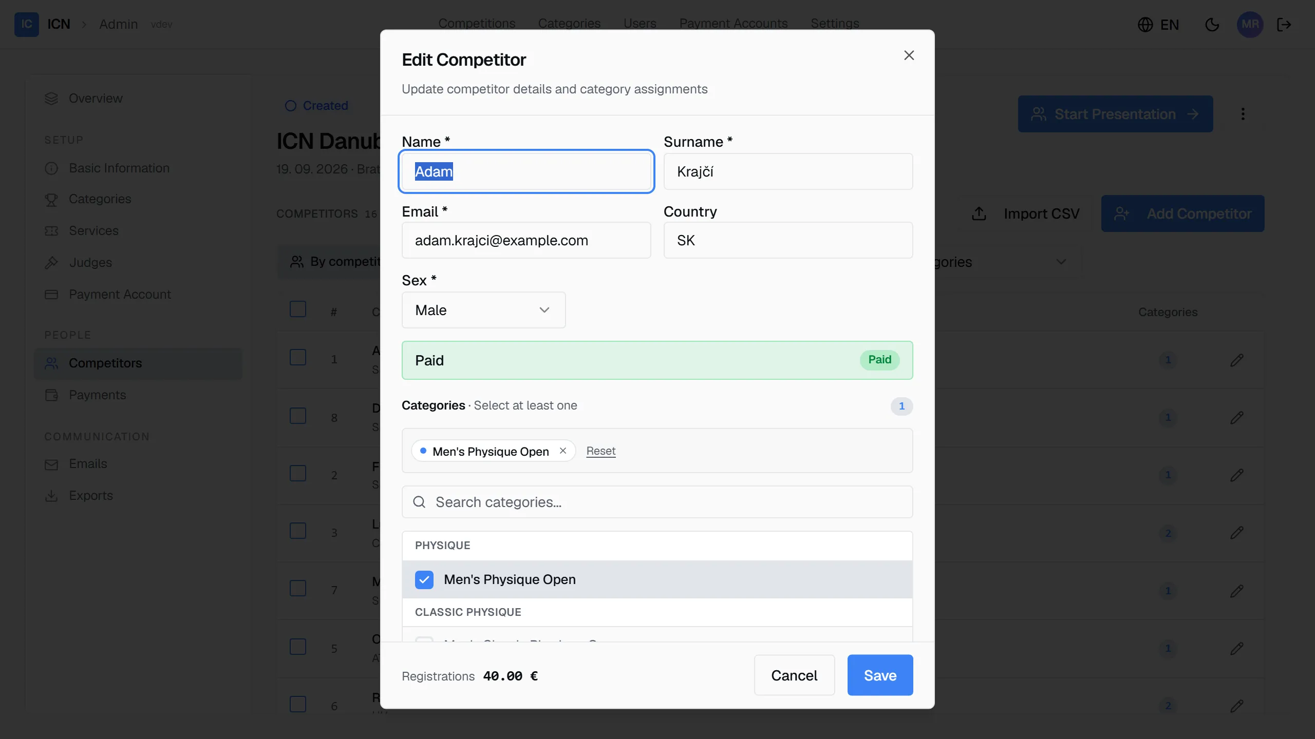 The edit competitor dialog with identity fields, payment state, and the category picker